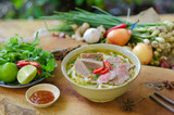 Vietnamese pho soup with beef, meatball, fresh vegetable