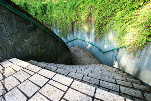 Spiral staircase of underground crossing in tunnel at Fort Canning Park, Singapore.