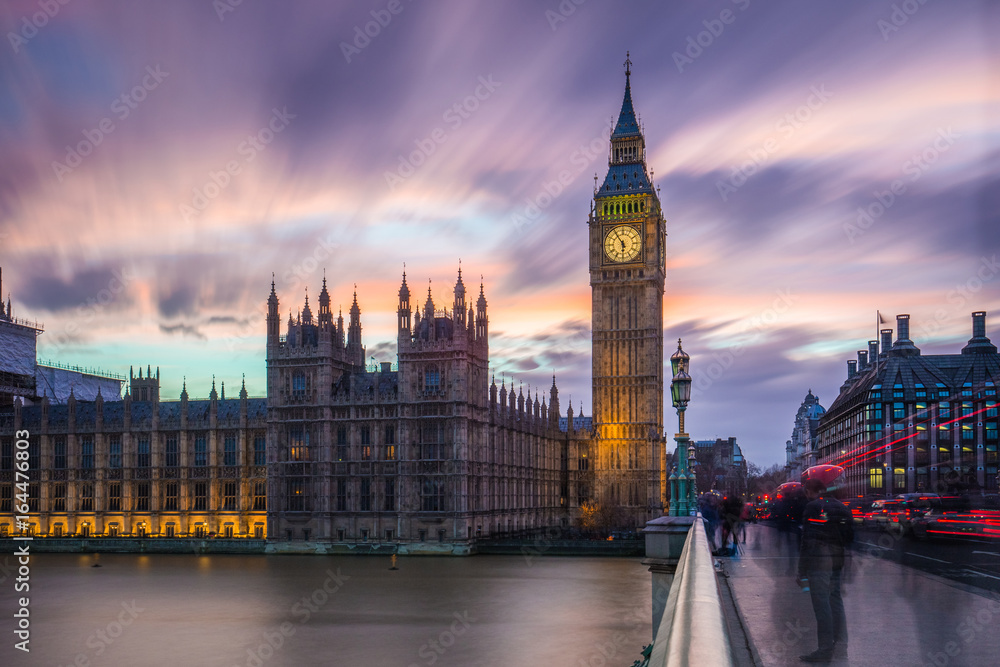 London, England - The Big Ben and the Houses of Parliament at dusk with beautiful colorful sky and clouds