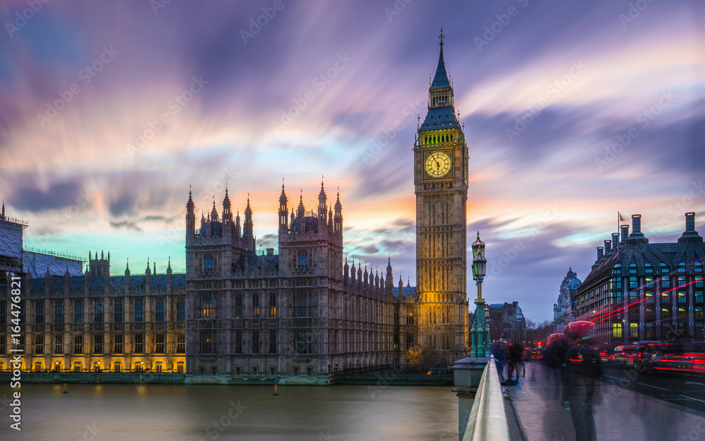 London, England - The Big Ben and the Houses of Parliament at dusk with beautiful colorful sky and clouds