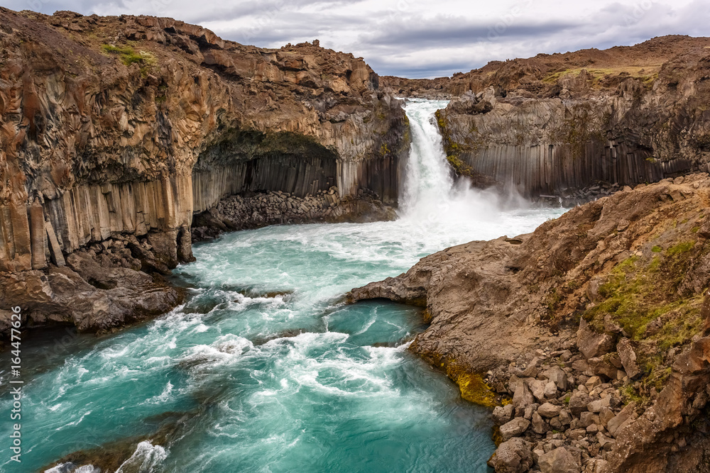 Naklejka premium Aldeyjarfoss waterfall among the rocks in Iceland
