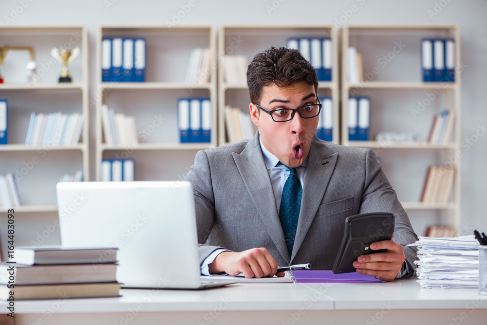 Funny businessman clown acting silly in the office Funny businessman clown acting silly in the office