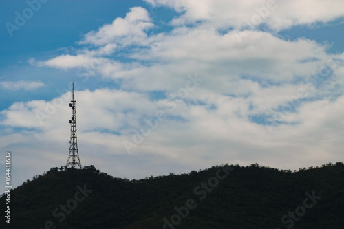 Telecommunication antenna under the blue sky with copy space for text or advertising or background