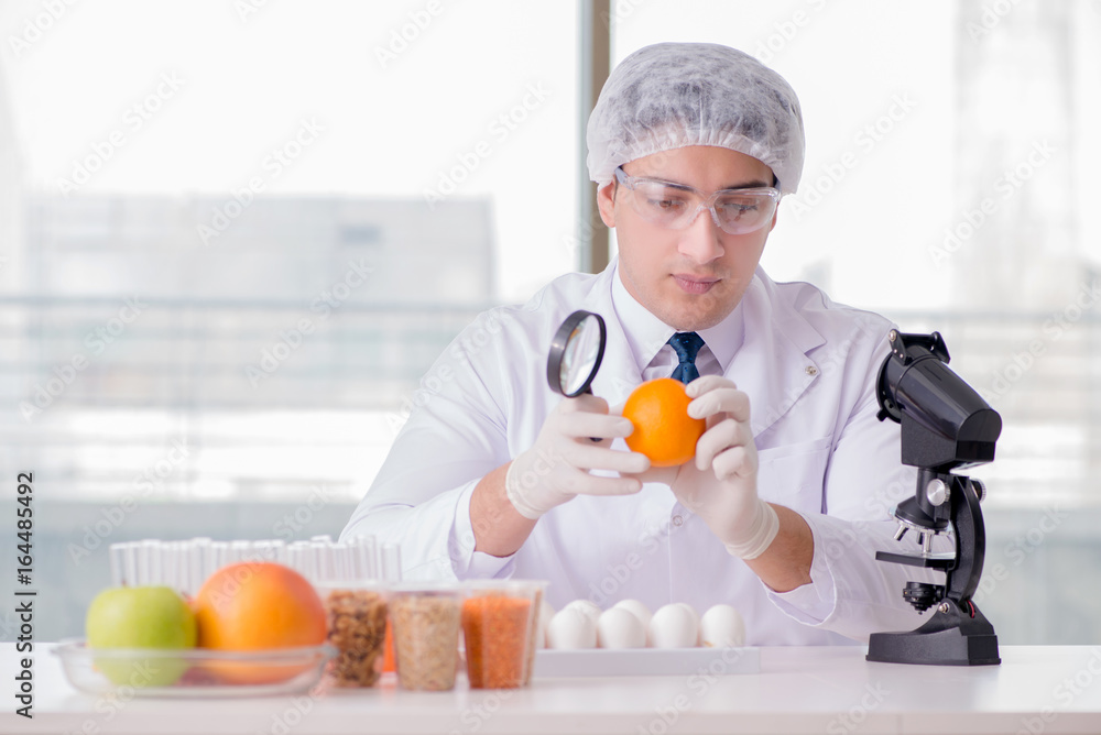 Nutrition expert testing food products in lab Nutrition expert testing food products in lab