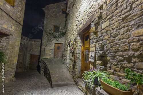Fototapeta Naklejka Na Ścianę i Meble -  Ainsa medieval village of the Pyrenees with beautiful stone houses at night, Huesca, Spain