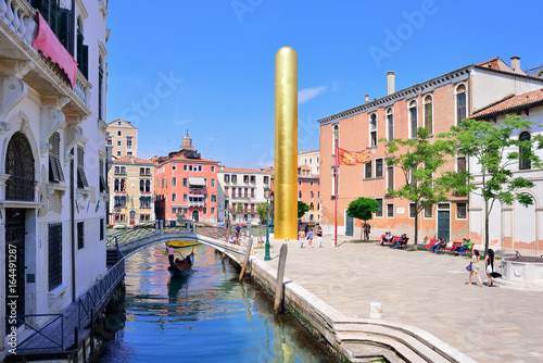 VENICE, ITALY - MAY, 2017: James Lee byars 20-meter-tall "golden tower" erected along venice's grand canal. Venice art biennale.