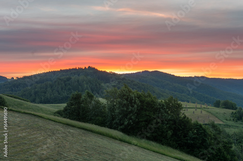 Fototapeta Naklejka Na Ścianę i Meble -  Moments before sunrise in cloudy Carpathian mountains, Poland