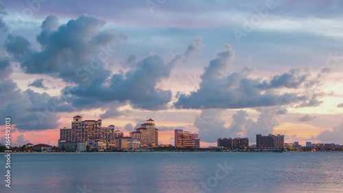 Sunset Timelapse of Resort Hotels on Goodman’s Bay in Nassau Bahamas with Fast Moving Clouds in a Vibrant Colored Sky