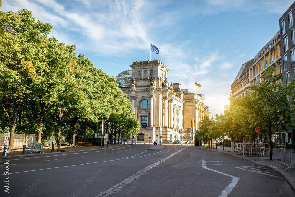 Street view with Reichtag building during the morning light in Berlin city