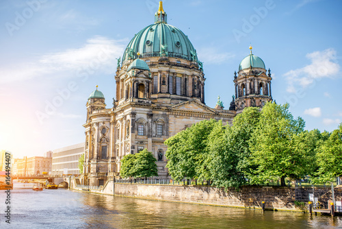 Sunrise view on the riverside with Dom cathedral in the old town of Berlin city