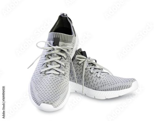 Grey sport male pair shoes isolated.