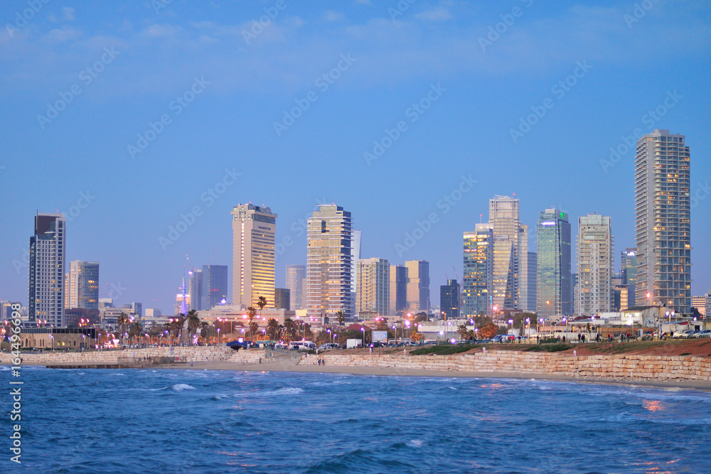 TEL AVIV, ISRAEL - APRIL, 2017: TEL AVIV, ISRAEL - APRIL, 2017: Evening view of the skyscrapers of Tel Aviv from the Mediterranean Sea.