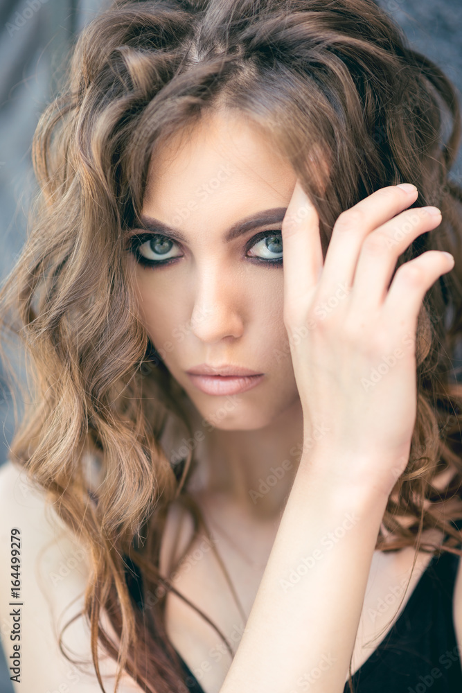 Face of beautiful brunette close-up. Beautiful, young brunette. Toneed image. Face of beautiful brunette close-up. Beautiful, young brunette. Toneed image.