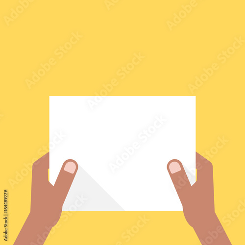 two dark-skinned hands holding white sheet