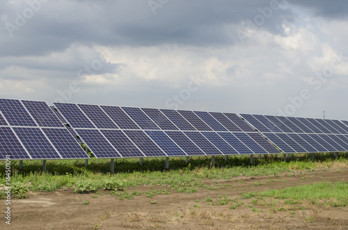 Solar panels on the sky background