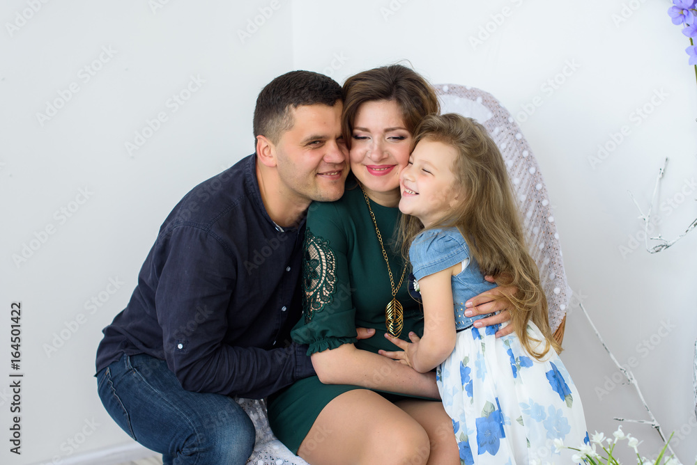 Pregnant family with her daughter girl spend time together at home. Pregnant family with her daughter girl spend time together at home.