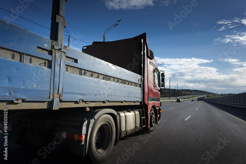 Truck on road. Delivery and shipping concept.