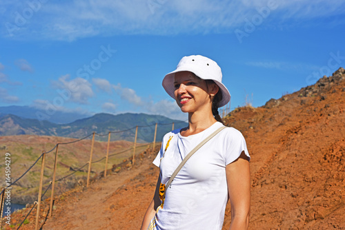 Young woman near Atlantic Ocean coasts. photo