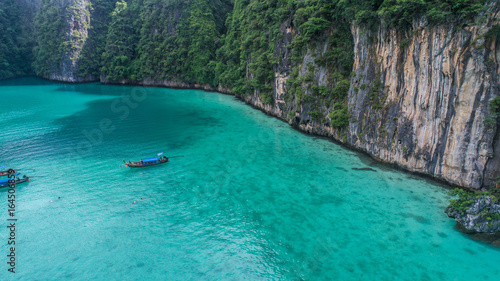 Aerial drone view of iconic tropical turquoise water Pileh Lagoon surrounded by limestone cliffs  Phi Phi islands  Thailand