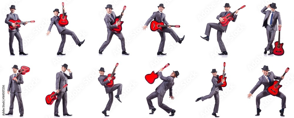 Businessman quitar player isolated on white Businessman quitar player isolated on white