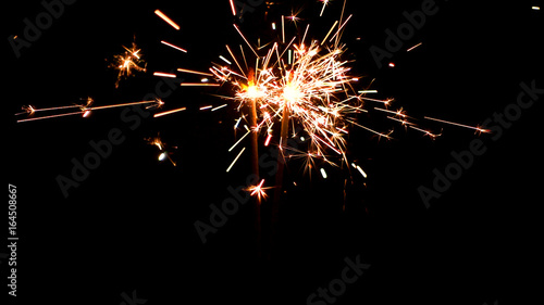 Wallpaper Mural Burning Sparklers in blurred motion. Christmas New Year and Independence Day celebration lights. Torontodigital.ca