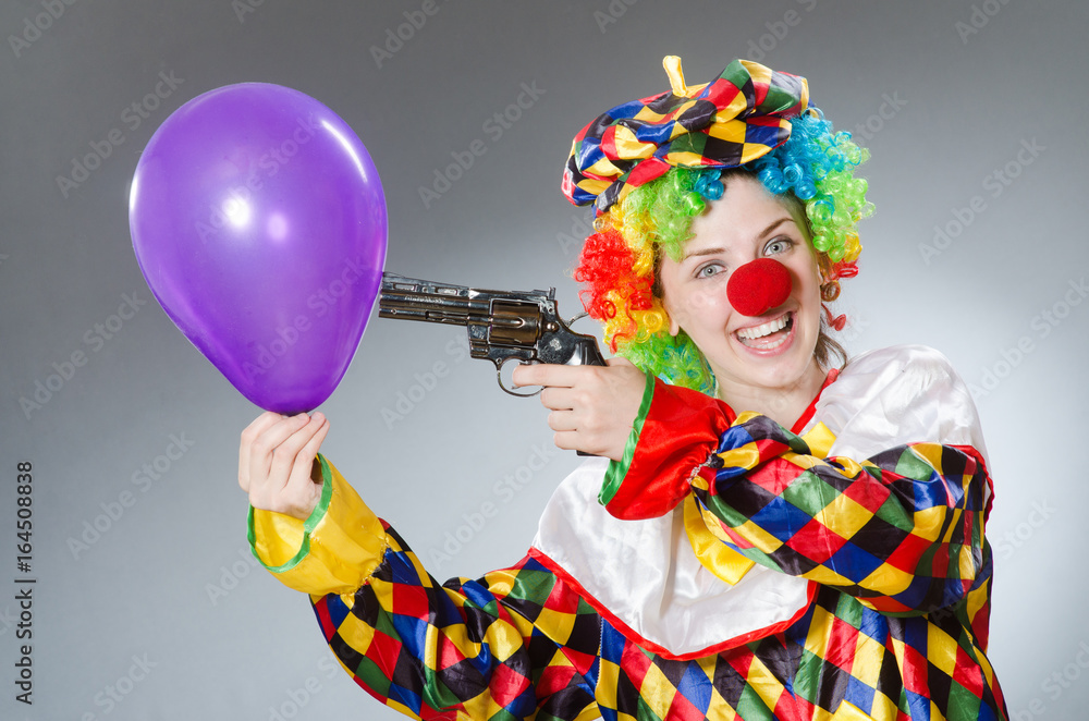 Funny clown in comical concept Funny clown in comical concept