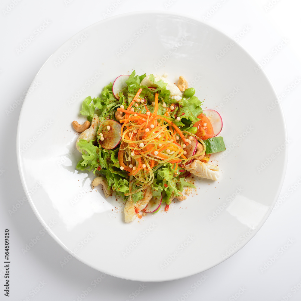 Warm salad with squid, vegetables with grape sauce. White background, menu concept. Flat lay. Warm salad with squid, vegetables with grape sauce. White background, menu concept. Flat lay.