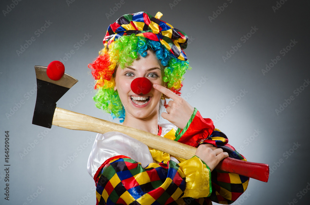 Funny clown in comical concept Funny clown in comical concept