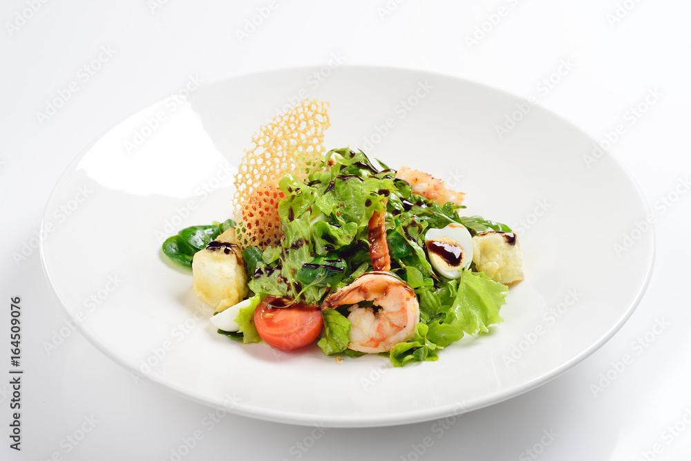 Salad with shrimps, Camembert cheese with French sauce. White background, menu concept. Salad with shrimps, Camembert cheese with French sauce. White background, menu concept.