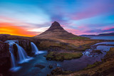 Kirkjufell Church mountain at sunset with pink and orange skyline, Iceland
