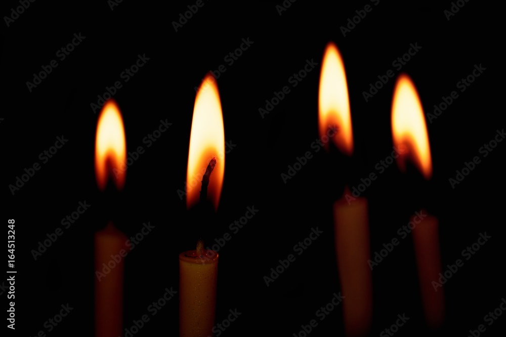 Group of Candles light on black background
Group of Candles light on black background