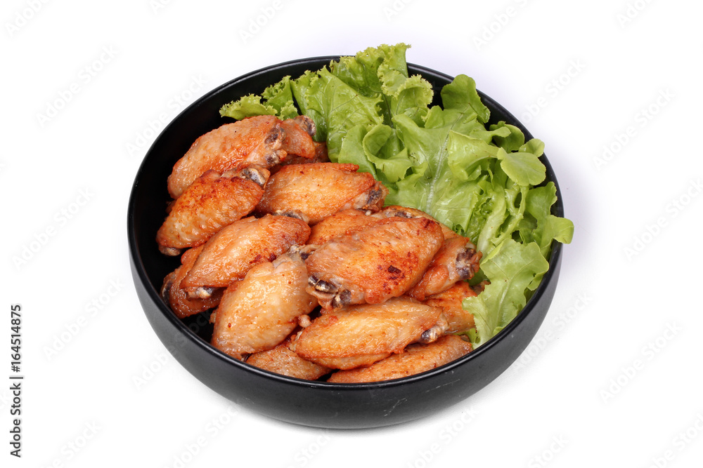 Deep fried chicken wings topped green oak. Deep fried chicken wings topped green oak.