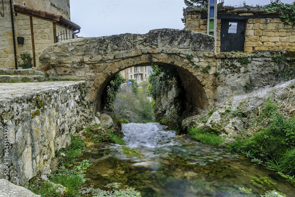 medieval bridge in the Tobera town in Burgos, castilla and Leon, Spain.