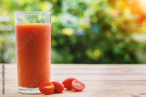 A glass of tomato juice on ...