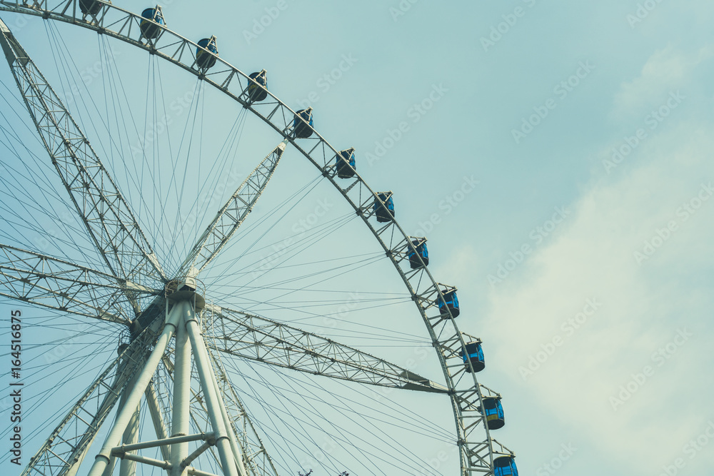 low angle view of Big ferris wheel with sky. low angle view of Big ferris wheel with sky.