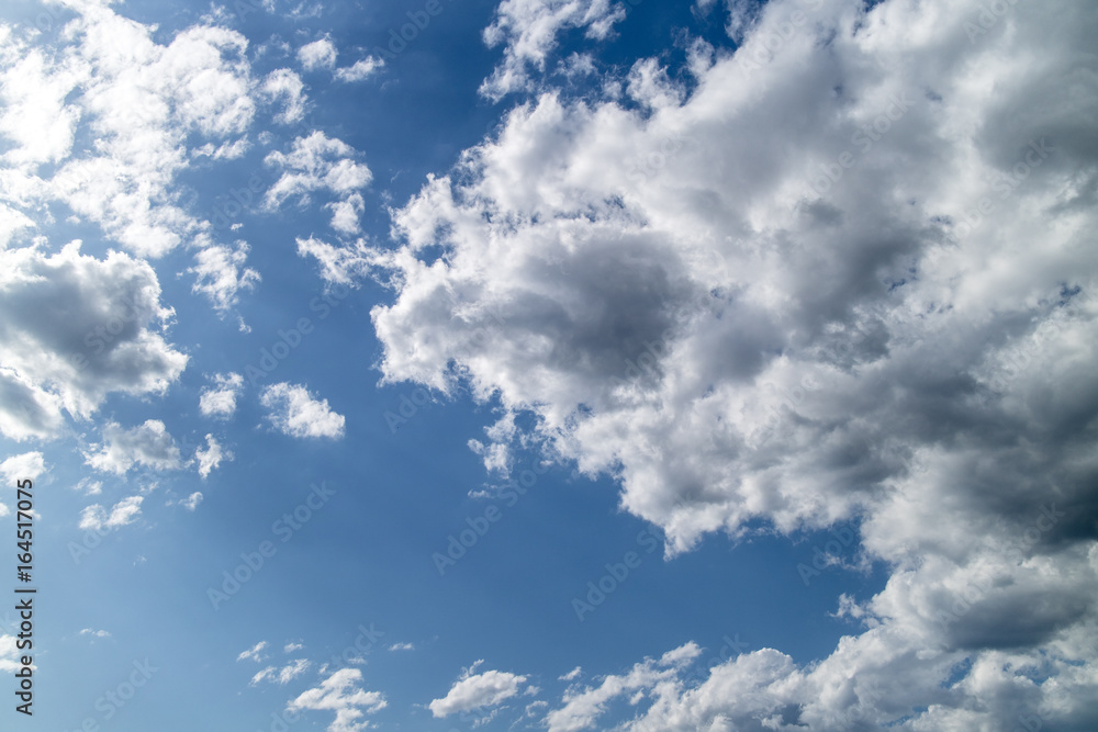 Fototapeta premium A bright blue background of sky and clouds 2