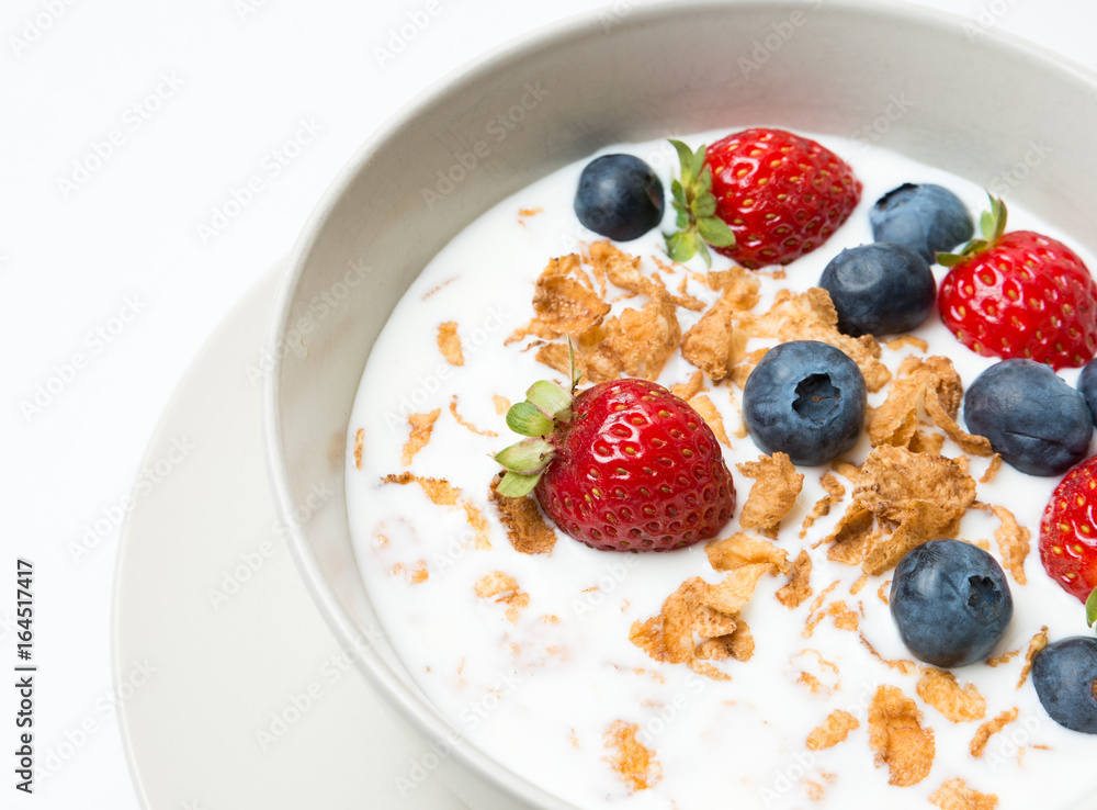 Cereal bowl with fruit healhy breakfast isolated on white Cereal bowl with fruit healhy breakfast isolated on white