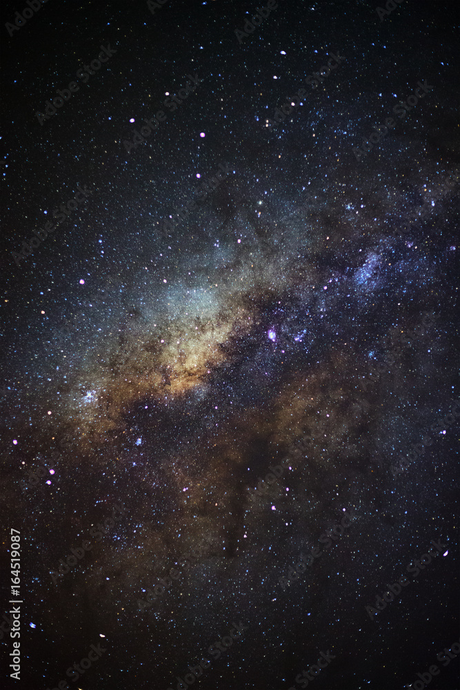 Naklejka premium The center of milky way galaxy. Long exposure photograph.with grain