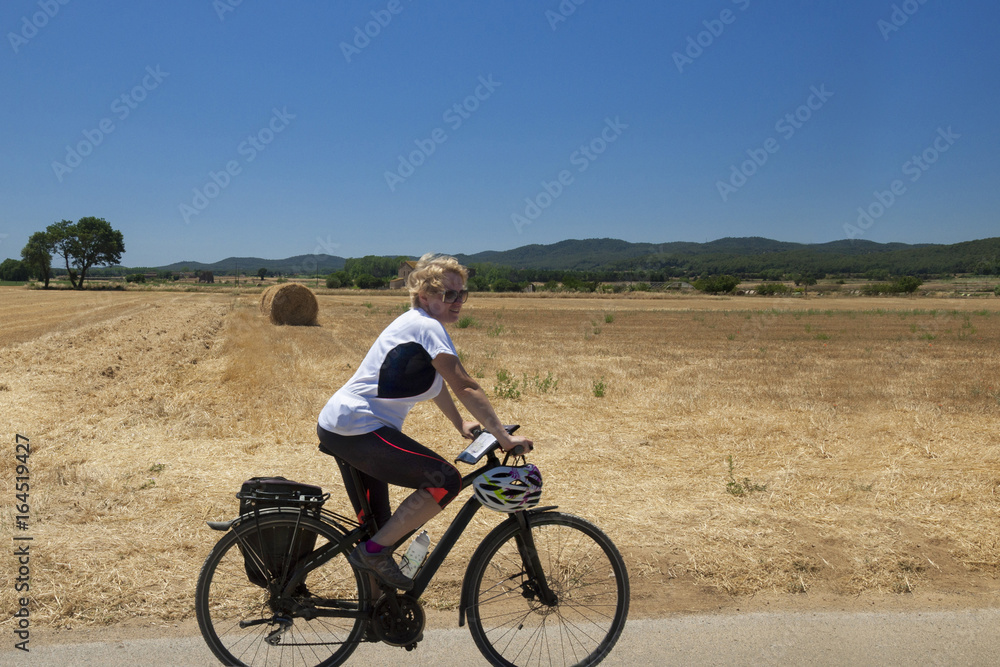A woman riding a bicycle