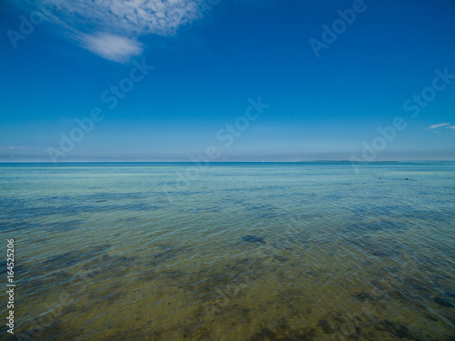 beautiful open water background  - baltic sea with blue sky