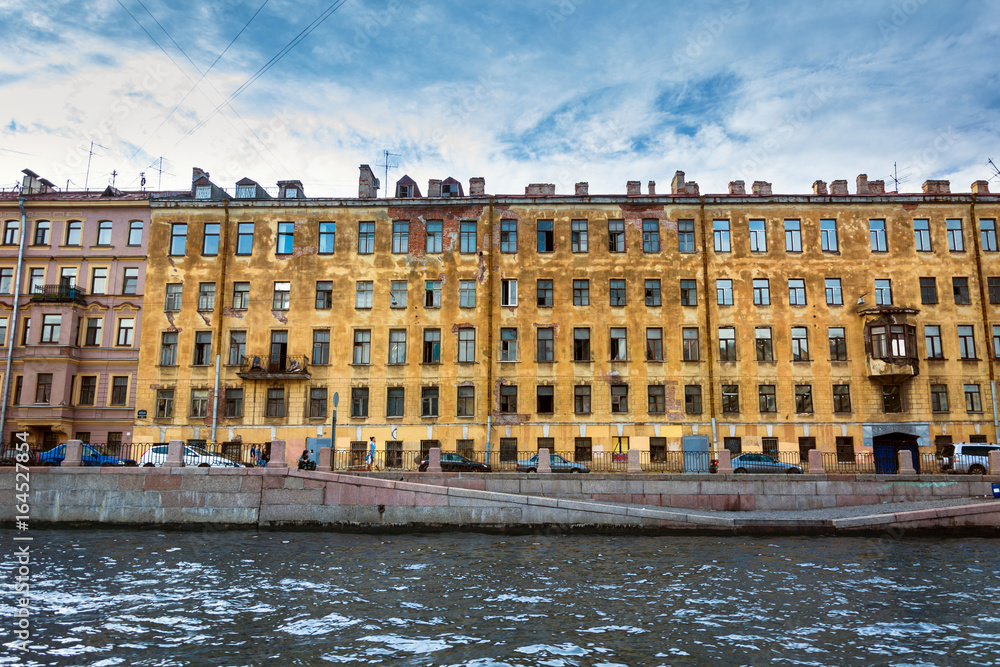 windows in very old building photo. Saint Petersburg