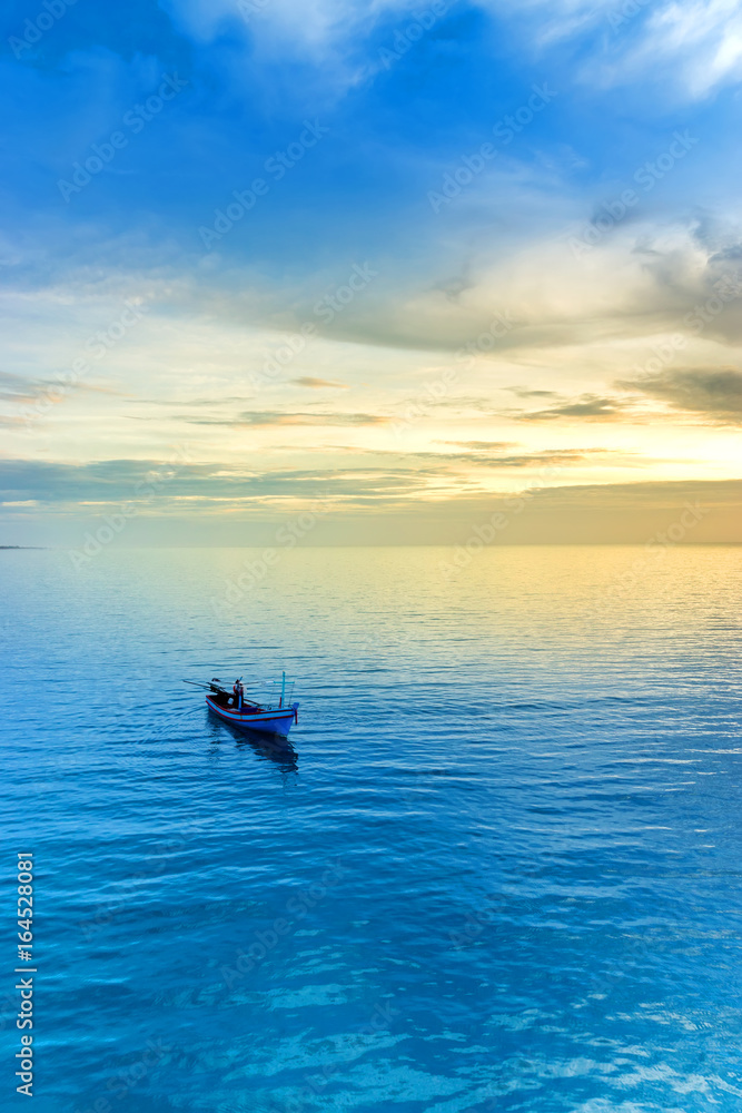 Fototapeta premium Minimal image of fishing boat on the sea.