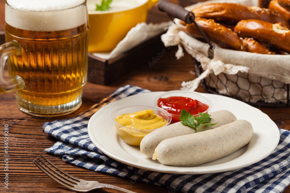 Boiled white sausage, served with beer and pretzels. Perfect for Octoberfest. Boiled white sausage, served with beer and pretzels. Perfect for Octoberfest.