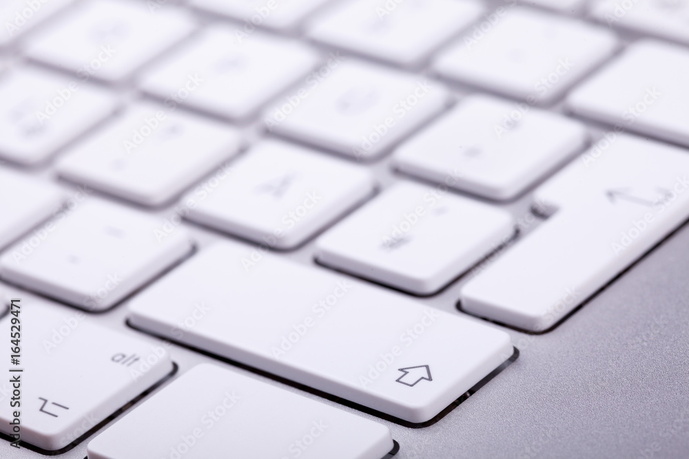 White aluminum keyboard in close up. Technology and communication White aluminum keyboard in close up. Technology and communication