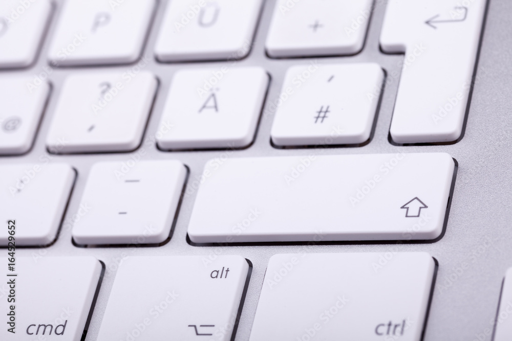 White aluminum keyboard in close up. Technology and communication White aluminum keyboard in close up. Technology and communication