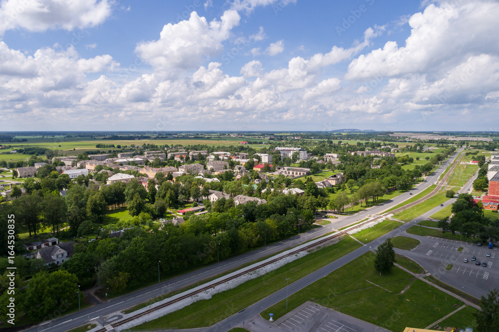 Aerial photography. Small city landscape, amazing clouds.