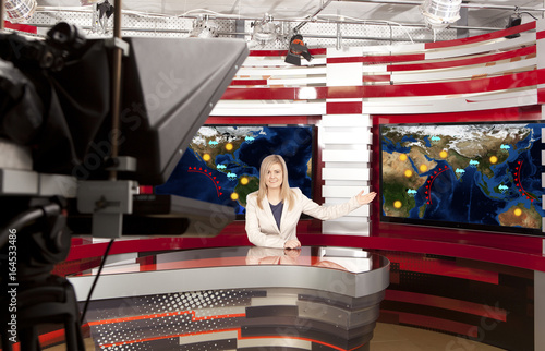 Принти на полотні A television anchorwoman at studio