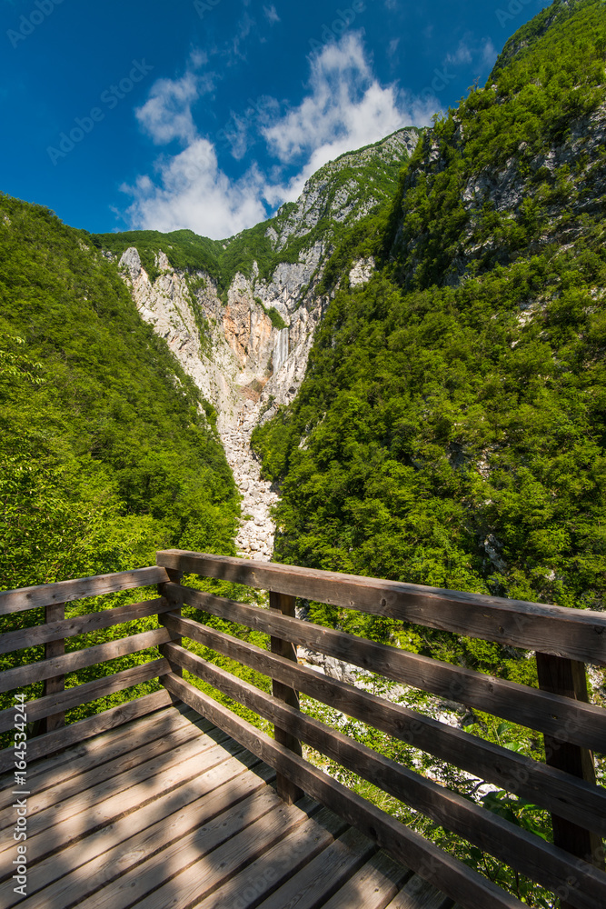 Wooden deck overlooking Boka waterfall in Slovenia