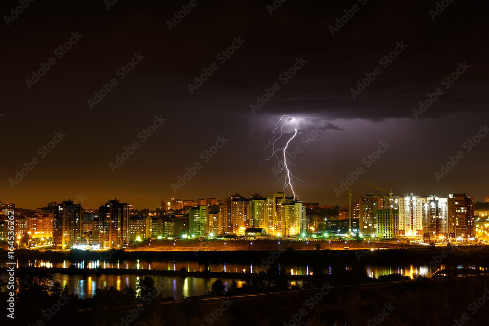 Lightning in the sky with cityscape