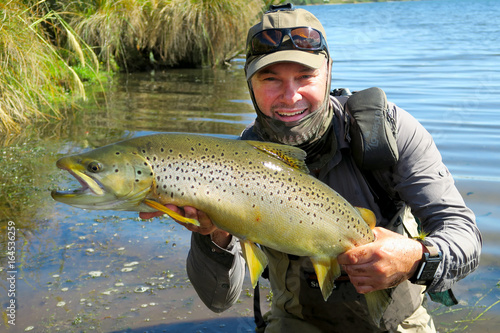 Fototapeta Naklejka Na Ścianę i Meble -  fly fishing new zealand river scene scenery trout